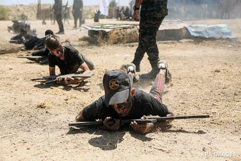 Young Palestinians attend a military summer camp organised by the Islamic Jihad Movement, in Gaza City, June 28, 2021. Photo by Dawoud Abu alkas
