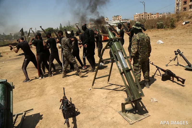 Young Palestinians attend a military summer camp organised by the Islamic Jihad Movement, in Gaza City, June 28, 2021. Photo by Dawoud Abu alkas