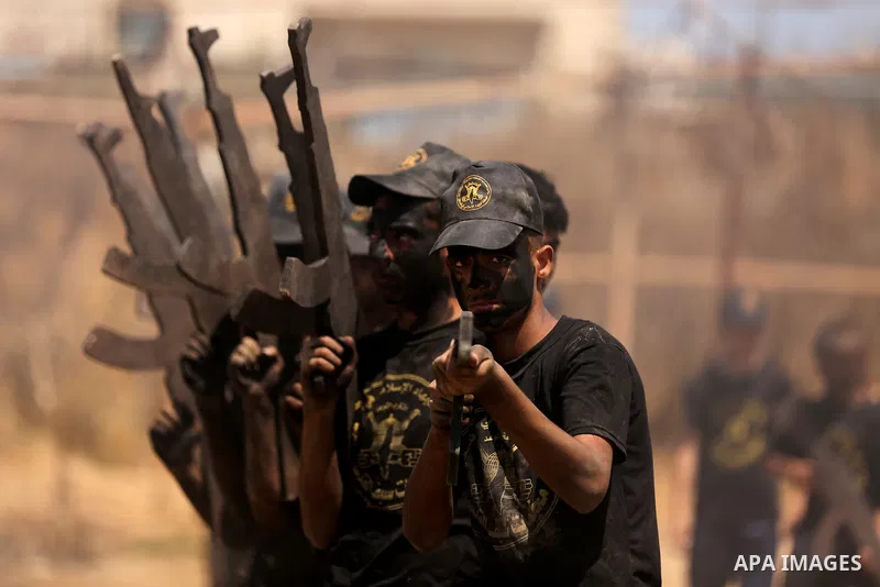 Young Palestinians attend a military summer camp organised by the Islamic Jihad Movement, in Gaza City, June 28, 2021. Photo by Dawoud Abu alkas