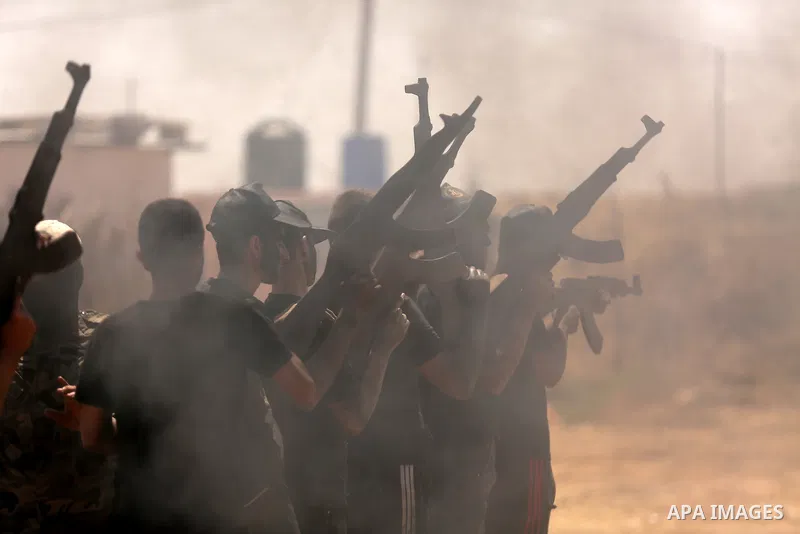 Young Palestinians attend a military summer camp organised by the Islamic Jihad Movement, in Gaza City, June 28, 2021. Photo by Dawoud Abu alkas