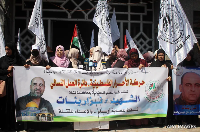Palestinian supporters of Al-Ahrar movement take part in a protest over the death of human rights activist Nizar Banat, in Gaza city June 29, 2021. Photo by Marihan Al-Khalidi