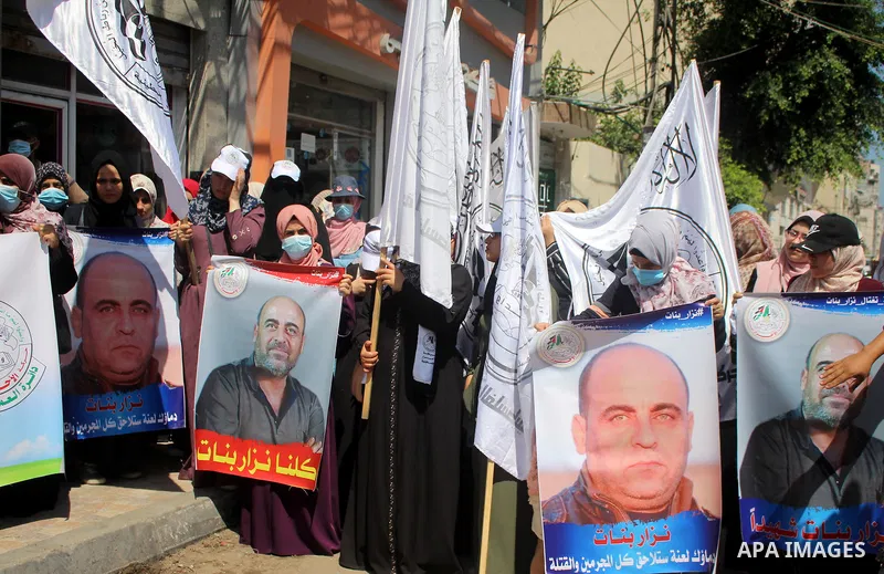 Palestinian supporters of Al-Ahrar movement take part in a protest over the death of human rights activist Nizar Banat, in Gaza city June 29, 2021. Photo by Marihan Al-Khalidi