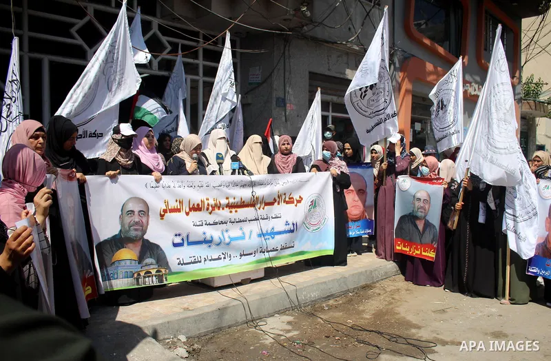 Palestinian supporters of Al-Ahrar movement take part in a protest over the death of human rights activist Nizar Banat, in Gaza city June 29, 2021. Photo by Marihan Al-Khalidi