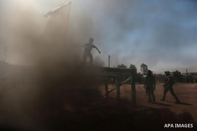 Young Palestinians attend a military summer camp organised by the Islamic Jihad Movement, in Gaza City, June 29, 2021. Photo by Mohammed Dahman Young Palestinians attend a military summer camp organised by the Islamic Ji...