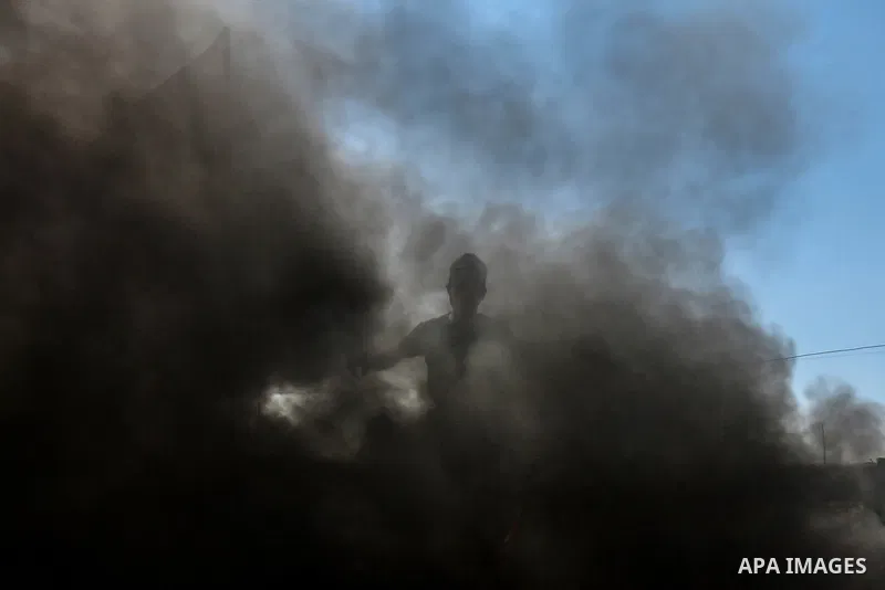 Young Palestinians attend a military summer camp organised by the Islamic Jihad Movement, in Gaza City, June 29, 2021. Photo by Mohammed Dahman Young Palestinians attend a military summer camp organised by the Islamic Ji...