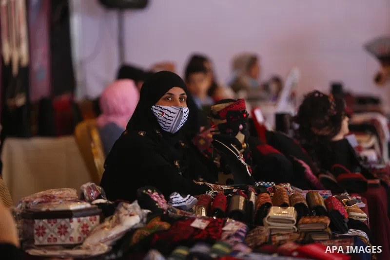 Palestinians attend the opening of the 15th annual exhibition entitled "Women’s Products" in Gaza City, on June 29, 2021. Photo by Ashraf Amra