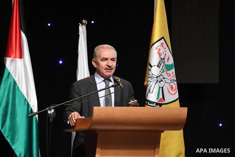 Palestinian Prime Minister Mohammed Ishtayeh, attends the first scientific conference "The Zionist Novel Between Refutation and Deconstruction", in the West Bank city of Ramallah on June 29, 2021 Photo by Prime Minister...