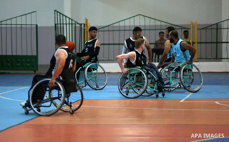 Disabled Palestinian men on wheelchairs participate in Super Wheelchair Basketball League in Gaza city, on June 29, 2021. The Super League wheelchair basketball matches are back after a year and a half break due to the C...