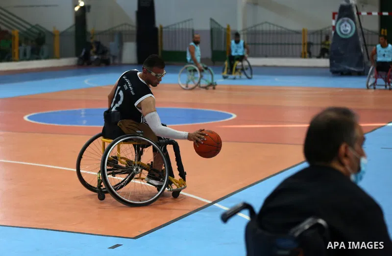 Disabled Palestinian men on wheelchairs participate in Super Wheelchair Basketball League in Gaza city, on June 29, 2021. The Super League wheelchair basketball matches are back after a year and a half break due to the C...