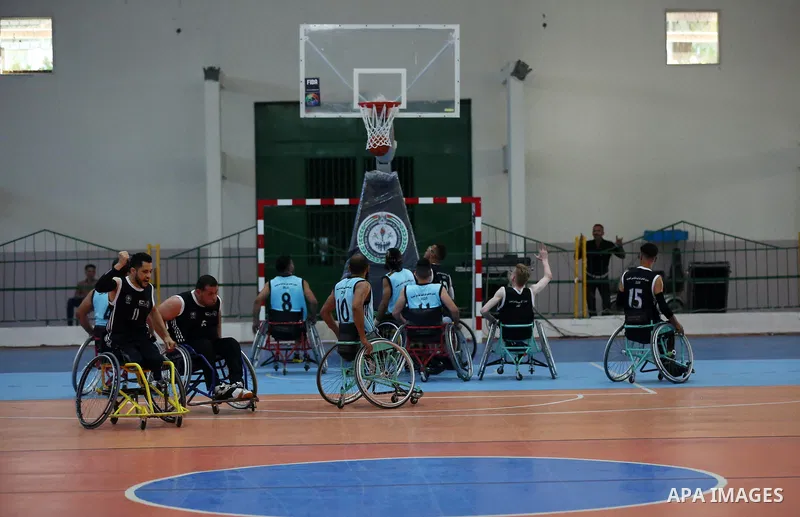 Disabled Palestinian men on wheelchairs participate in Super Wheelchair Basketball League in Gaza city, on June 29, 2021. The Super League wheelchair basketball matches are back after a year and a half break due to the C...
