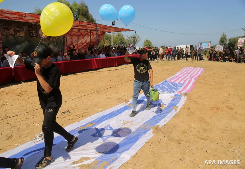 Young Palestinians take part in a graduation ceremony at a military summer camp organised by the Islamic Jihad Movement, in Gaza City June 30, 2021. Photo by Dawoud Abu alkas