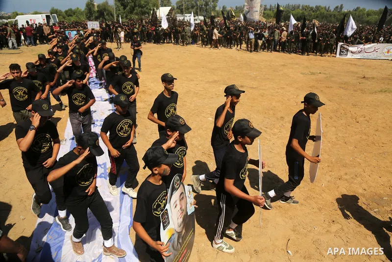 Young Palestinians take part in a graduation ceremony at a military summer camp organised by the Islamic Jihad Movement, in Gaza City June 30, 2021. Photo by Dawoud Abu alkas