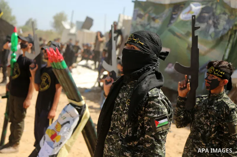 Young Palestinians take part in a graduation ceremony at a military summer camp organised by the Islamic Jihad Movement, in Gaza City June 30, 2021. Photo by Dawoud Abu alkas