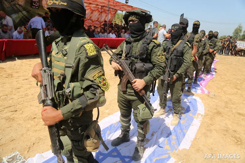 Young Palestinians take part in a graduation ceremony at a military summer camp organised by the Islamic Jihad Movement, in Gaza City June 30, 2021. Photo by Dawoud Abu alkas
