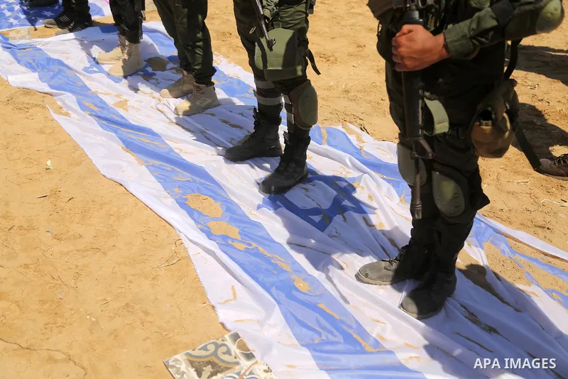 Young Palestinians take part in a graduation ceremony at a military summer camp organised by the Islamic Jihad Movement, in Gaza City June 30, 2021. Photo by Dawoud Abu alkas