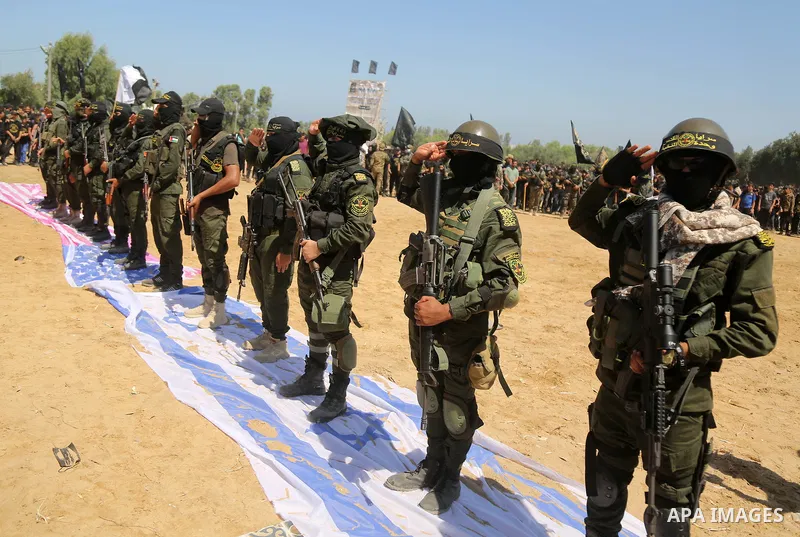 Young Palestinians take part in a graduation ceremony at a military summer camp organised by the Islamic Jihad Movement, in Gaza City June 30, 2021. Photo by Dawoud Abu alkas