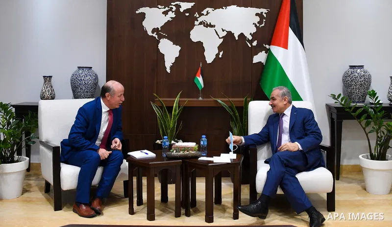 Palestinian Prime Minister Mohammed Ishtayeh meets with The Regional Director of the United Nations Population Fund “UNFPA” Louay Shabana, in the West Bank city of Ramallah on June 30, 2021. Photo by Prime Minister Offic...