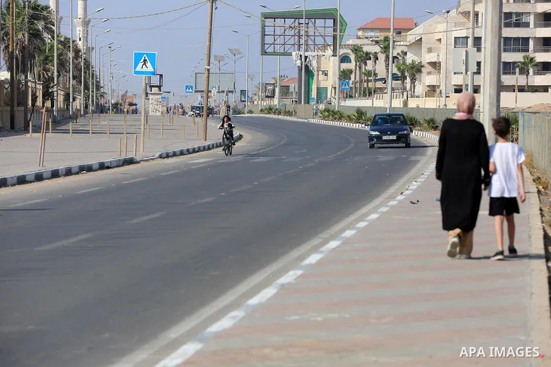 Palestinians take part in a bike race championship including disabled people, in Gaza city, on June 30, 2021. Photo by Ashraf Amra