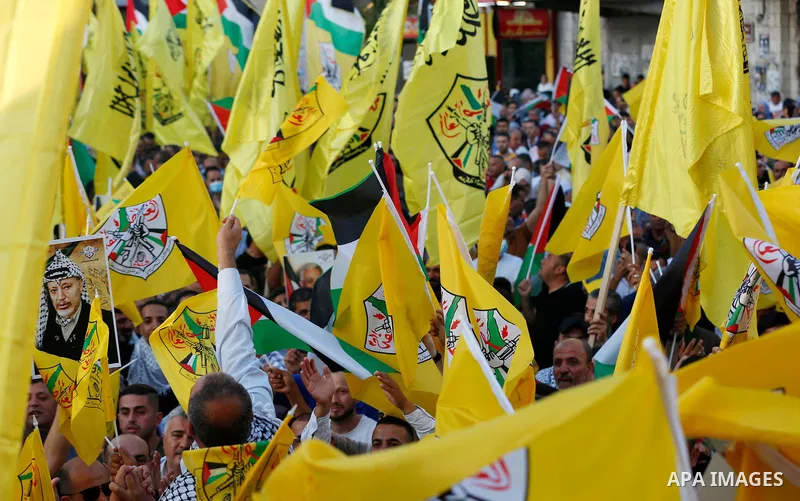 Palestinian supporters Fatah movement take part in a rally in support of Palestinian president Mahmud Abbas in the West Bank city of Nablus on June 30, 2021. Photo by Stringer