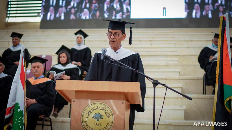 Palestinian students attend their graduation ceremony at Birzeit University in the West Bank city of Ramallah, on June 30, 2021. Photo by Eyad Jadallah