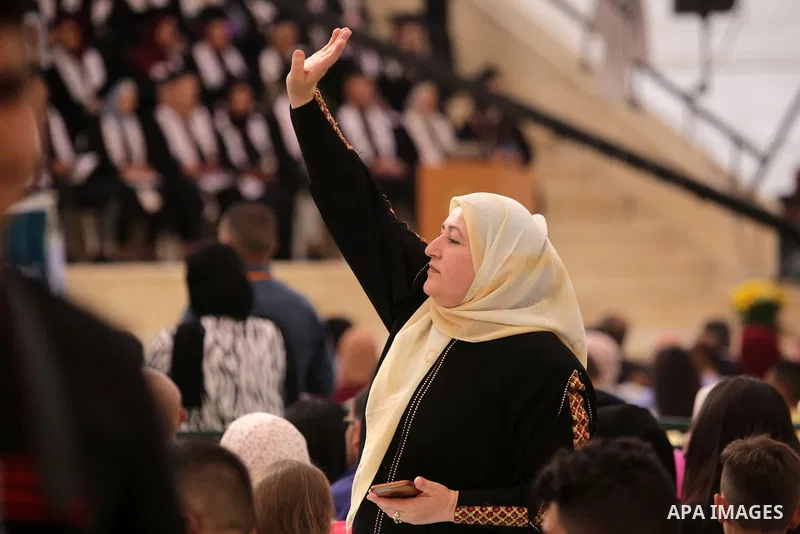 Palestinian students attend their graduation ceremony at Birzeit University in the West Bank city of Ramallah, on June 30, 2021. Photo by Ibrahim atta