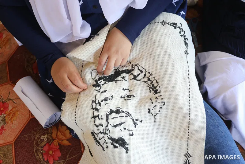 Palestinians take part in an event entitled "The return march is salt of the land and the homeland" near the border fence with Israel, in Maghazi refugee camp in the central Gaza Strip on July 1, 2021. Photo by Ashraf Am...