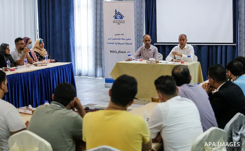 Palestine Ambassador to Britain Husam Zomlot meets with Palestinian journalists in Gaza City, on July 1, 2021. Photo by Hatem Rawagh