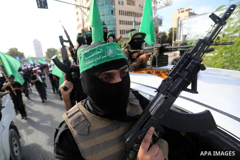 Young Palestinians take part in a graduation ceremony at a military summer camp organised by the Hamas Movement, in Gaza City July 01, 2021. Photo by Ashraf Amra