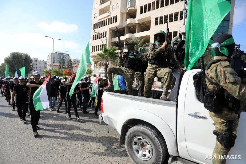 Young Palestinians take part in a graduation ceremony at a military summer camp organised by the Hamas Movement, in Gaza City July 01, 2021. Photo by Ashraf Amra