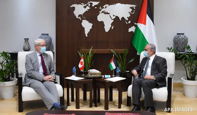 Palestinian Prime Minister Mohammad Ishtayeh meets with Canadian Foreign Minister Marc Garneau, in the West Bank city of Ramallah on July 05. 2021. Photo by Prime Minister Office