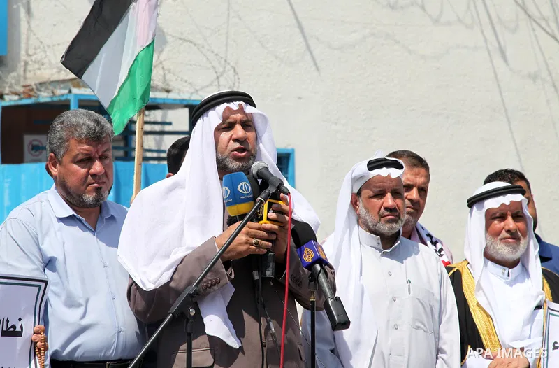 Palestinian clans take part in a protest to demand the opening of the crossings and reconstruction and the entry of building materials, in front of the headquarter United Nation "UNSCO" in Gaza city, on July 11 2021. Pho...