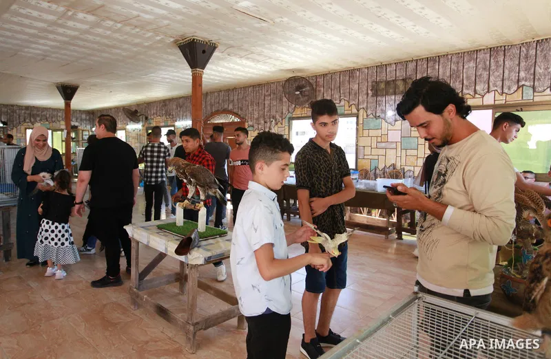 Palestinians attend a pet exhibition during the third day of Eid al-Adha festival celebrated by Muslims worldwide, in Gaza City on July 22, 2021. The al-Adha, or "Feast of Sacrifice", marks the end of the annual pilgrima...