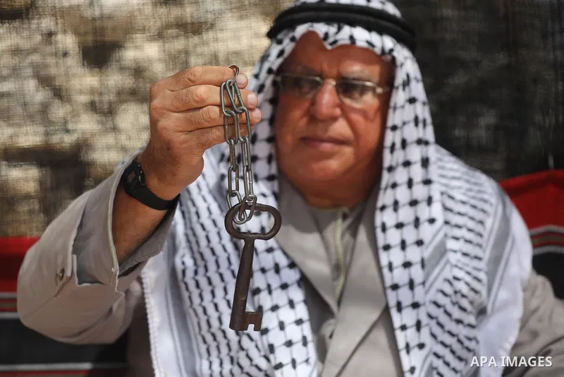 Palestinians attend an exhibition entitled "Our Heritage, Our Identity" marking the Palestinian traditional customs day, in Gaza City, on July 25, 2021. Palestinian costumes are the traditional clothing worn by Palestini...