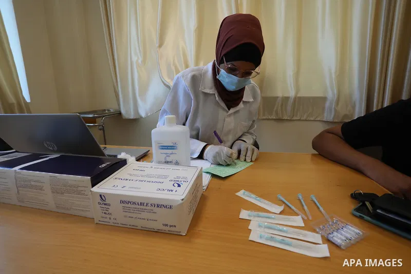Palestinians receive the dose of the coronavirus disease (COVID-19) vaccine at the UNRWA clininc, in Gaza city on July 27, 2021. A total of 477,027 people have been vaccinated against the coronavirus in the West Bank and...