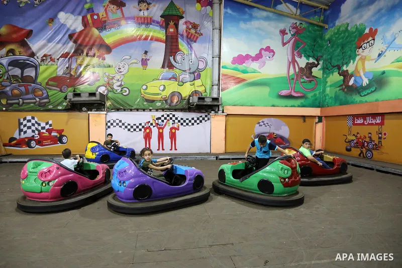 Palestinian children who their relatives killed by Israeli airstrikes during the recent conflict between Israel and Hamas attend a fun day, in Gaza City, on July 28, 2021. The Gaza Strip remains in ruins two months after...