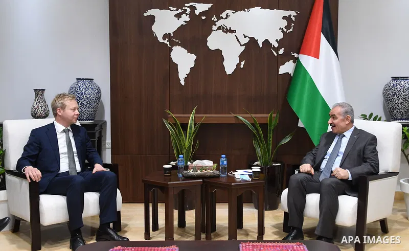 Palestinian Prime Minister Mohammad Ishtayeh meets with European Envoy for the Middle East Peace Process Sven Koepmans, in the West Bank city of Ramallah on July 28, 2021. Photo by Prime Minister Office