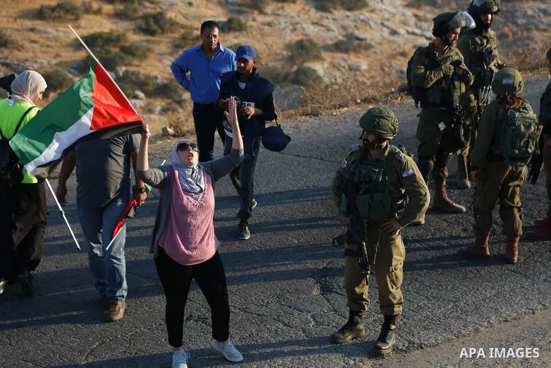 Israeli soldiers clash with Palestinian protesters near a previously-evacuated Israeli army camp that was taken over by settlers, at Tayasir checkpoint east of Tubas in the north of the occupied West Bank, on July 31, 20...