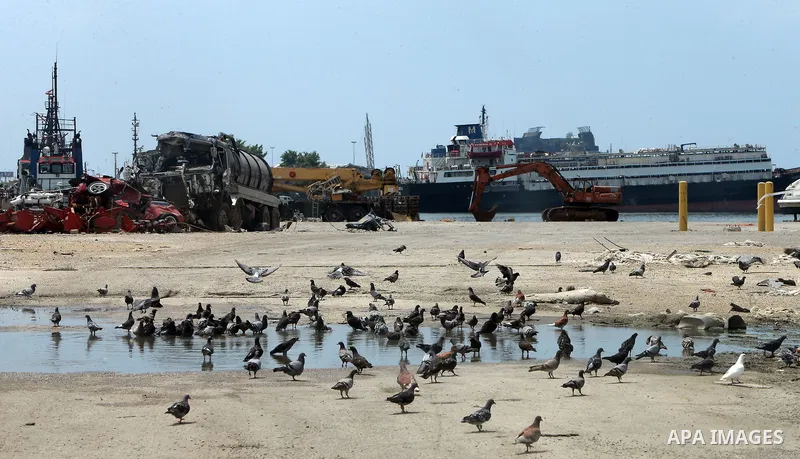 A general view shows the damaged at the port on August 4, 2021, as Lebanon marks a year since a cataclysmic explosion ravaged the capital Beirut. Photo by Haitham Moussawi
