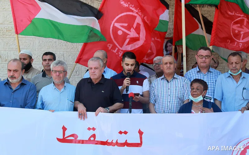 Palestinian supporters of the Popular Front for the Liberation of Palestine, take part in a protest to show solidarity with prisoners on hunger strike in Israeli Jails, in front of the headquarters of Red cross in Gaza c...