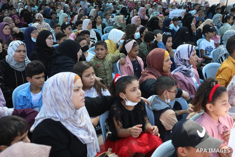 Palestinian orphans take part in a rally demanding their rights, in Gaza seaport, on August 10, 2021. The fiscal position in Gaza strip has worsened not only due to the outbreak but also due to a political standoff that...