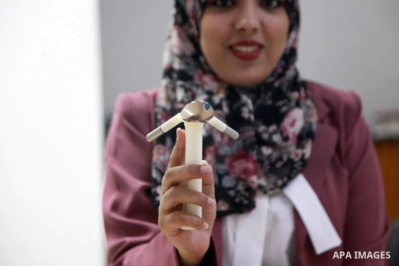 Palestinian graduates show the smart spoon that helps people eat without spilling, in Gaza city on august 11, 2021. Smart spoon built with simple tools, these specially designed spoons make it much easier for people with...