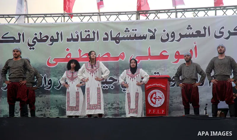 Palestinian supporters of the Popular Front for the Liberation of Palestine (PFLP) take part in a rally marking the The 20th anniversary of the killing of Abu Ali Mustafa, leader of (PFLP), in Gaza city on August 14, 202...