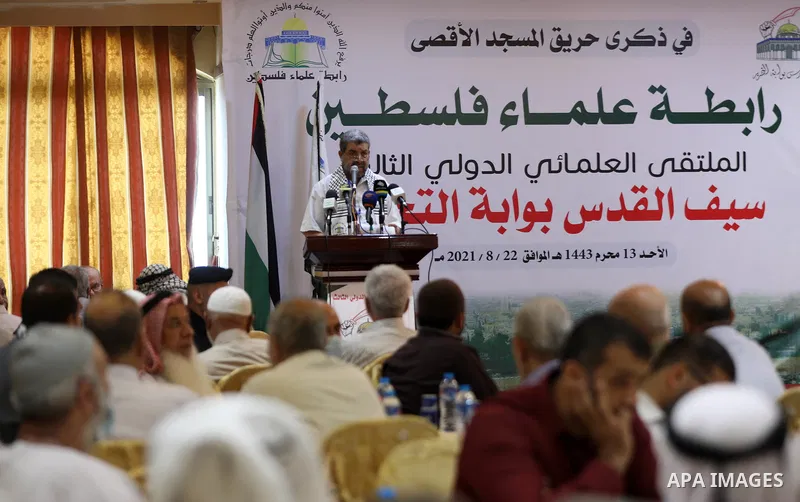 Members of the Palestine Scholars Association, take part in the International Scholars Forum, in Gaza city, on August 22, 2021. Photo by Mahmoud Nasser