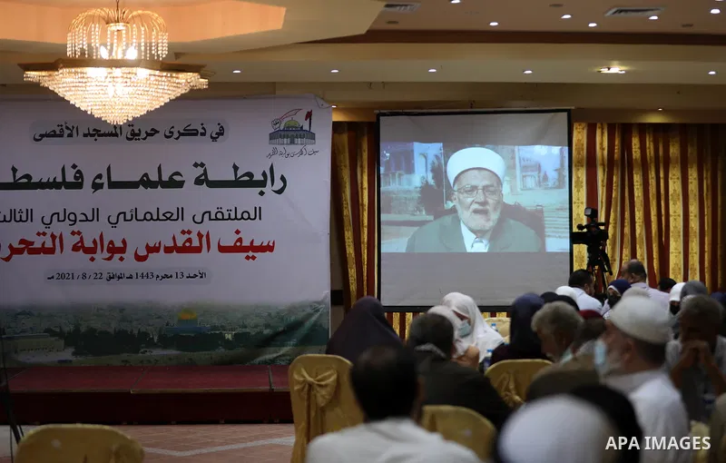 Members of the Palestine Scholars Association, take part in the International Scholars Forum, in Gaza city, on August 22, 2021. Photo by Mahmoud Nasser