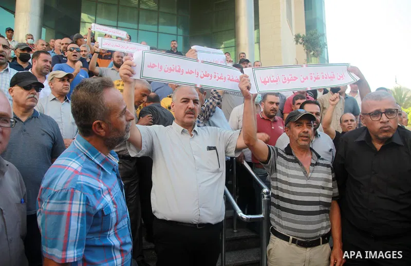 Palestinian military retirees take part in a protest to demand the cancellation of the Mandatory retirement law, in Gaza city, on August 23, 2021. Palestinian Prime Minister Mohammad Shtayyeh previously announced that 6,...