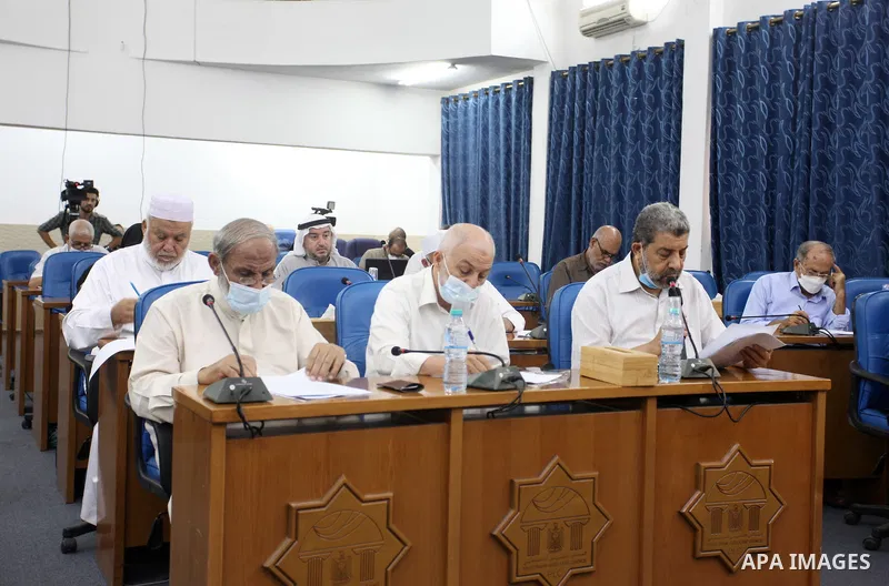 Palestinian Members of Legislative Council, attend a meeting on the 52nd anniversary of the burning of the blessed Al-Aqsa Mosque, at the legislative council, in Gaza city on August 23, 2021. Photo by Youssef Abu Watfa