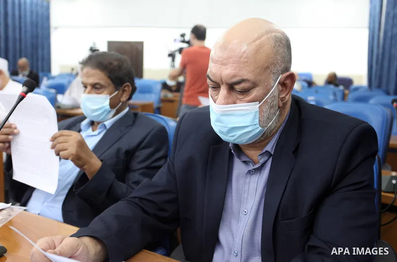 Palestinian Members of Legislative Council, attend a meeting on the 52nd anniversary of the burning of the blessed Al-Aqsa Mosque, at the legislative council, in Gaza city on August 23, 2021. Photo by Youssef Abu Watfa