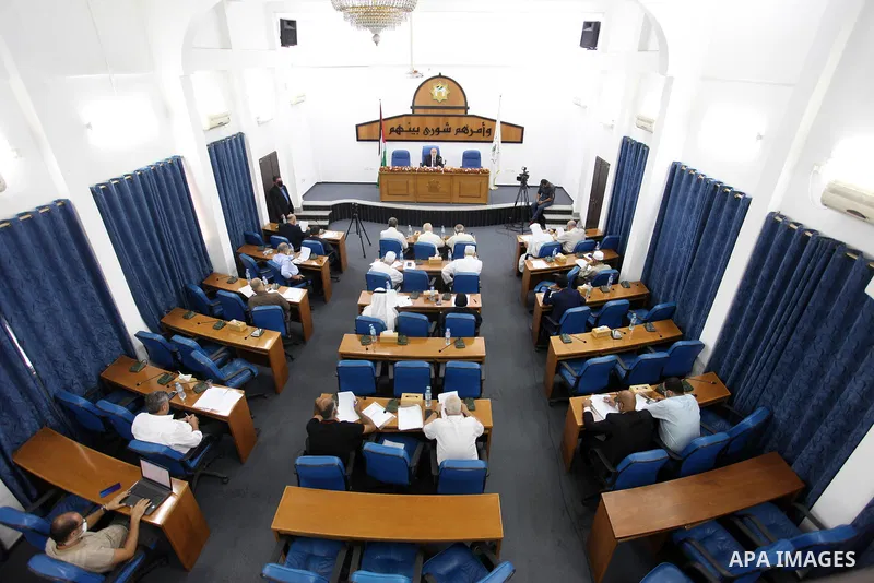 Palestinian Members of Legislative Council, attend a meeting on the 52nd anniversary of the burning of the blessed Al-Aqsa Mosque, at the legislative council, in Gaza city on August 23, 2021. Photo by Youssef Abu Watfa