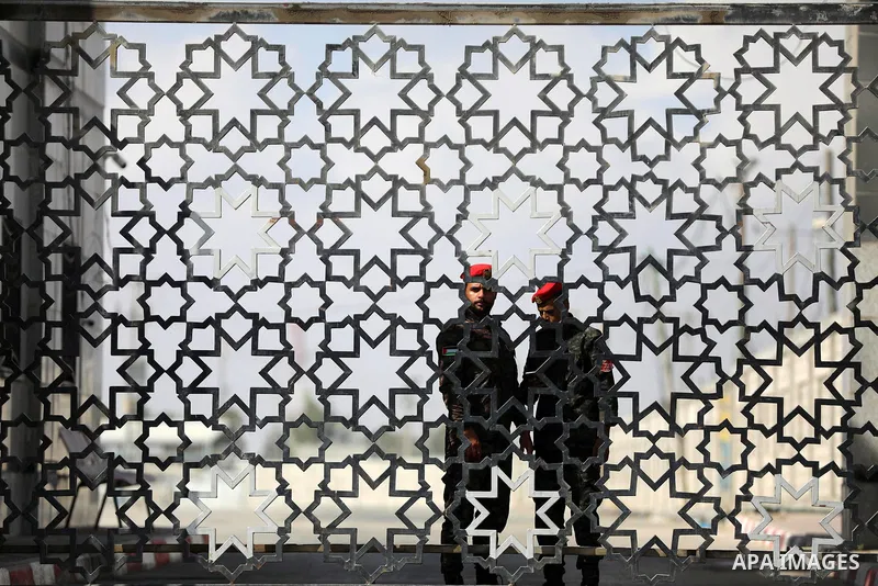 Members of Palestinan security forces stand guard at the closed down Rafah border crossing to Egypt in the southern Gaza Strip, on August 23, 2021. Egypt has told Gaza authorities it will close the Rafah border crossing...
