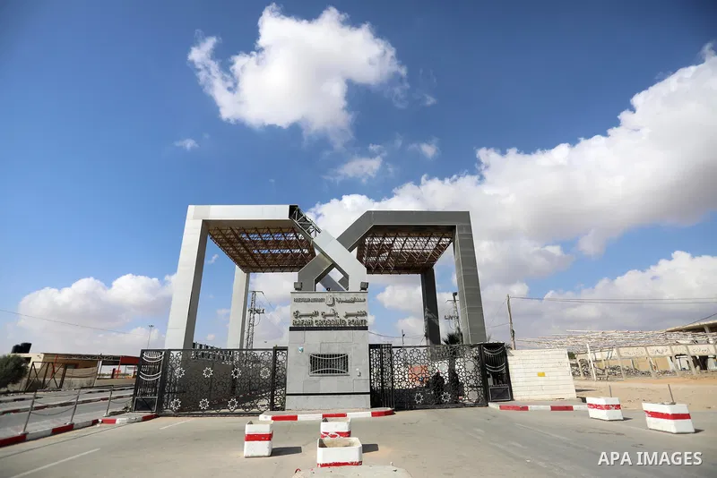 Members of Palestinan security forces stand guard at the closed down Rafah border crossing to Egypt in the southern Gaza Strip, on August 23, 2021. Egypt has told Gaza authorities it will close the Rafah border crossing...